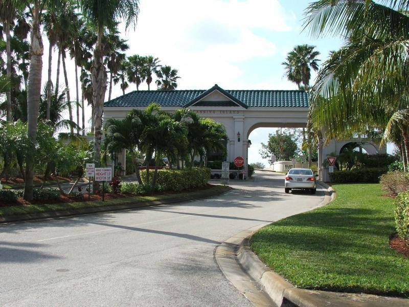Lansing Island Indian Harbour Beach Florida - an exclusive private gated luxury estate island community - view of the front guard gate